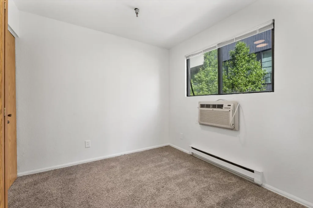 Empty bedroom at Pepper Park, 1 bedroom apartments Boulder, CO