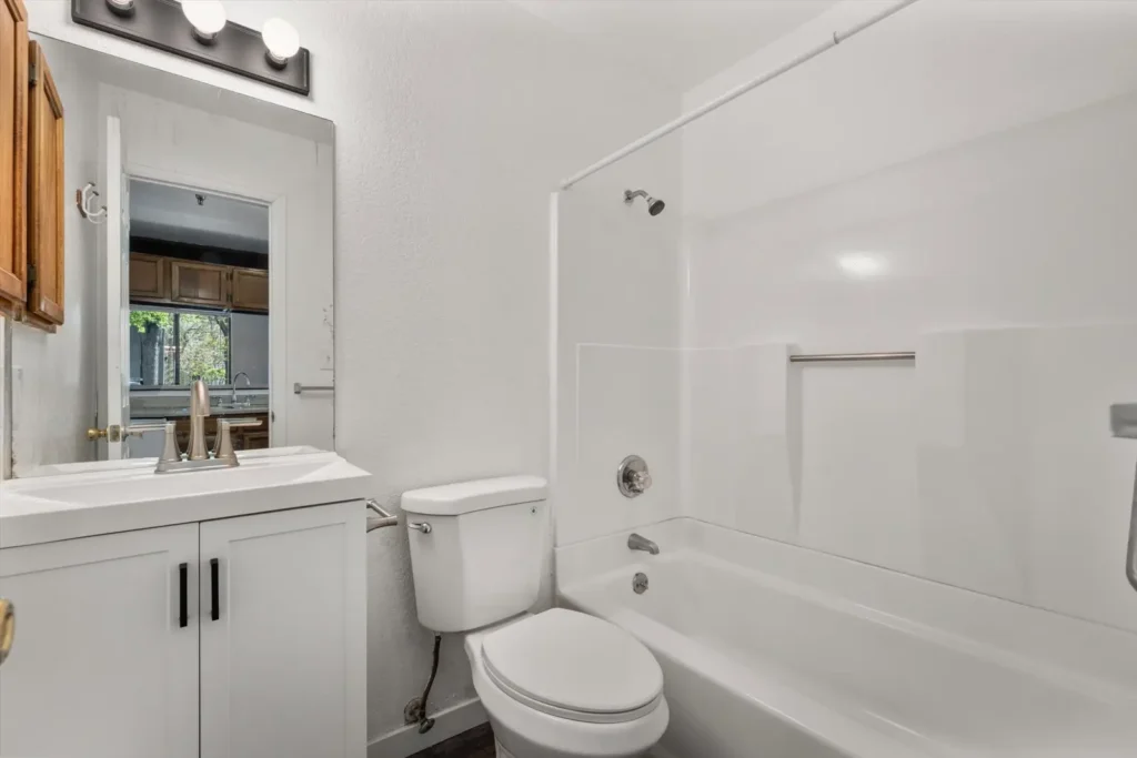 Modern bathroom with tub at Pepper Park, apartments for rent near University of Colorado Boulder