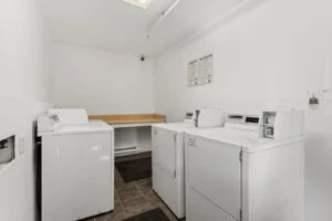 on-site laundry room at Pepper Park, apartments near CU Boulder