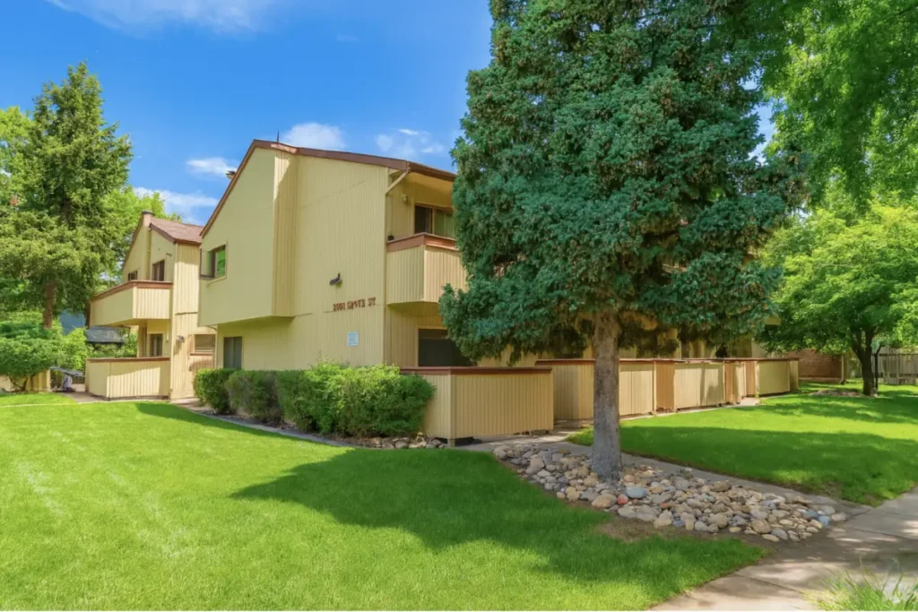community exterior surrounded by greenery at Grove Street, Boulder, Colorado apartment complexes