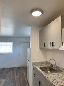 compact kitchen at Grove Street, studio apartments Boulder, CO