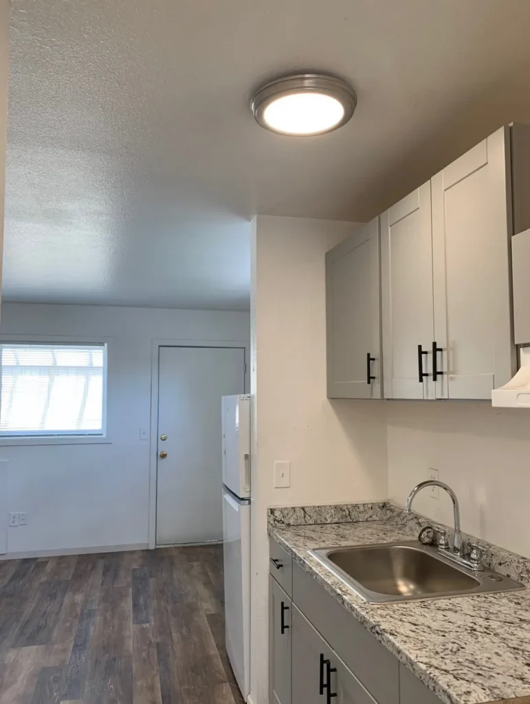 compact kitchen at Grove Street, studio apartments Boulder, CO