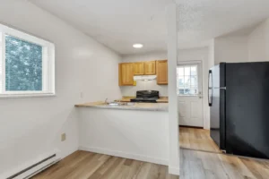 Modern kitchen and dining area at Goss Commons, apartments Boulder, Colorado