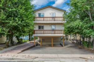 apartment exterior with covered parking at Goss Commons, Boulder apartments