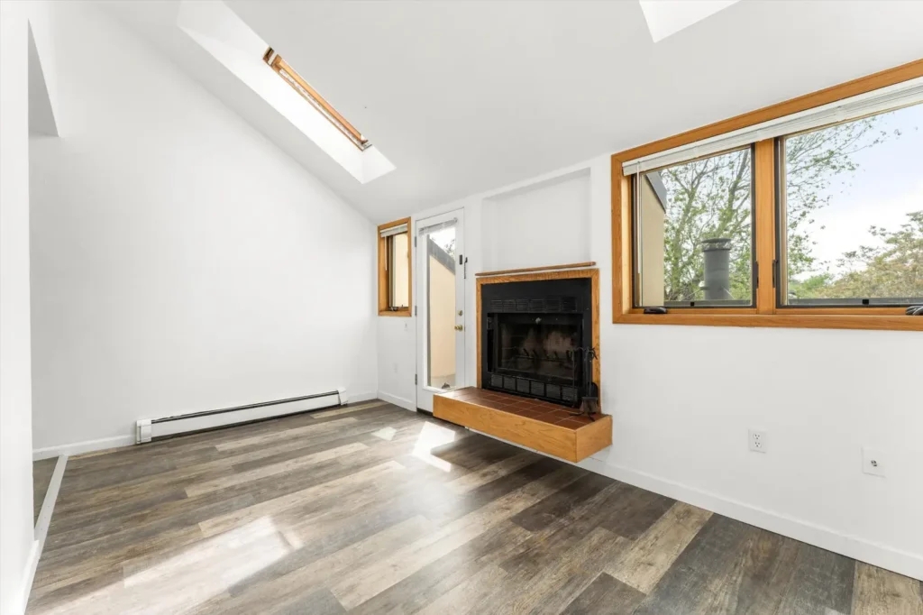 Living room with fireplace at Canyon Crest, Boulder, CO apartments
