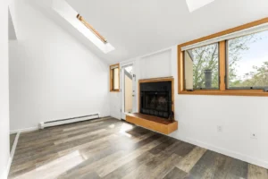 Living room with fireplace at Canyon Crest, Boulder, CO apartments