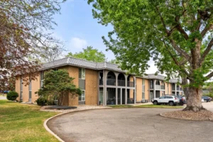 building exterior surrounded by trees at Mohawk Junior, Boulder apartments for rent