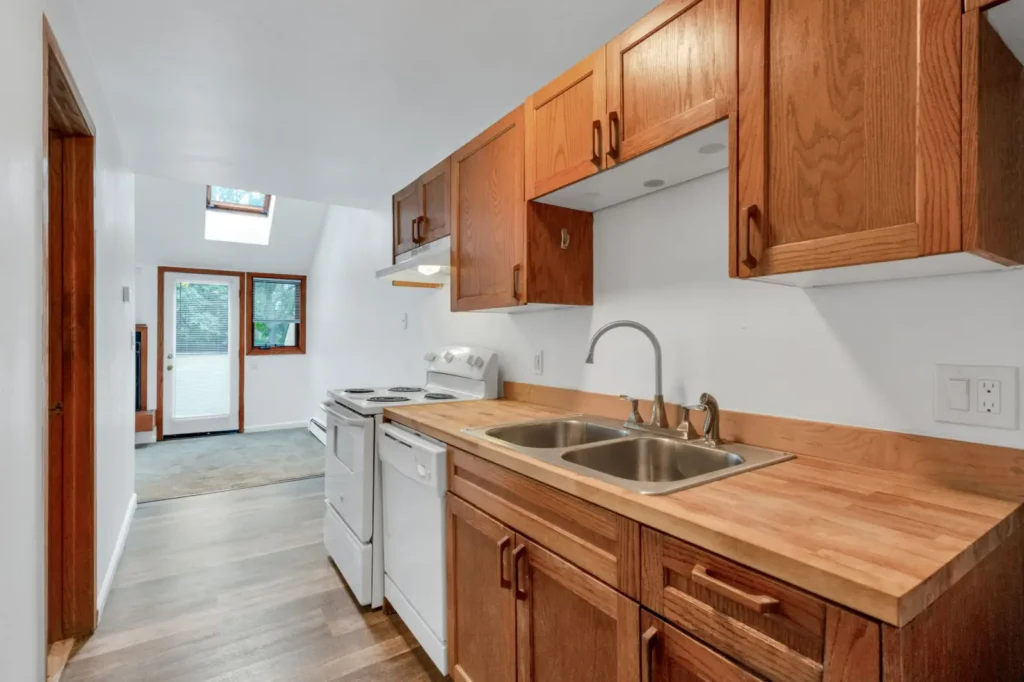 kitchen with wood cabinetry at Canyon Crest, apartments for rent Boulder, Colorado